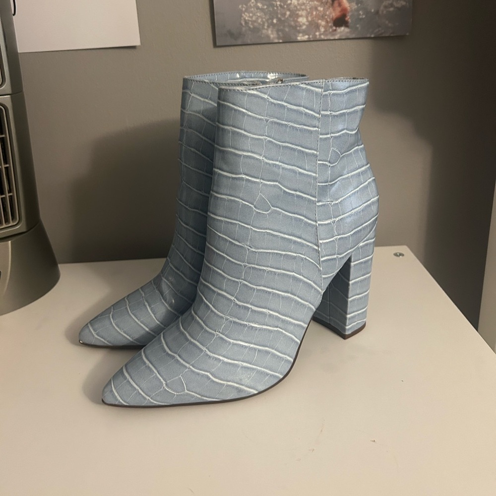 Light blue snake skin heeled boots